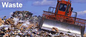 Icon for the waste sector: image of a trash compacter in a landfill.