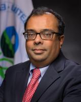 Cecil Rodrigues with the EPA Seal in Background