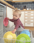 Picture of a kid loading a dishwasher