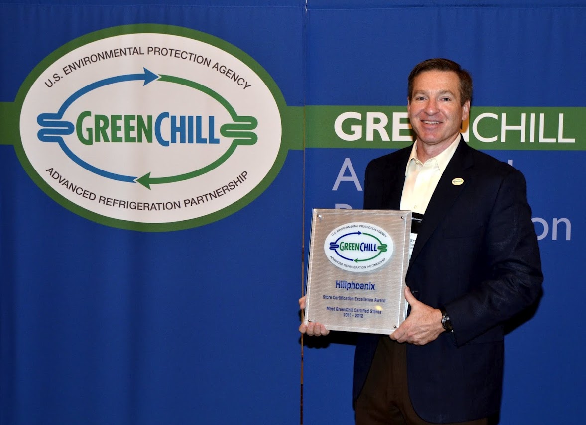 Scott Martin from Hillphoenix accepts an award from GreenChill for manufacturing systems for the largest number of GreenChill-certified store this year 