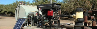 Picture of a large stationary engine providing power to an agricultural operation