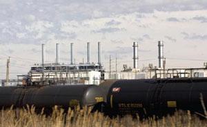 Industrial facility with storage tanks visible