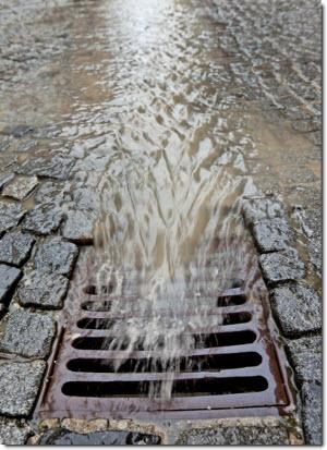 Water rushing into a stormdrain