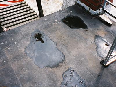 puddles on flat roof