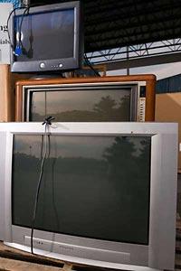 televisions stacked for recycling
