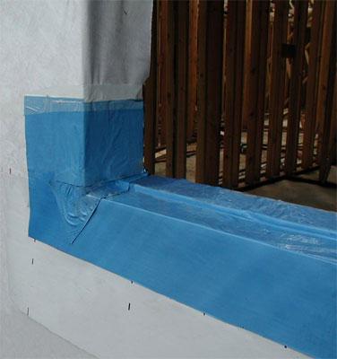 An example of window flashing, applied so that water drains to the outside
