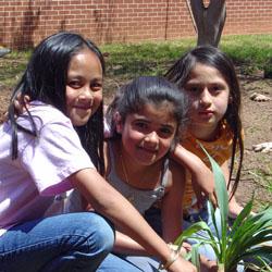 Photo of three girls smiling