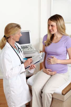 Pregnant woman with a doctor