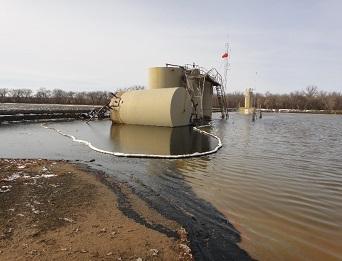 Tank leaking oil into a river in North Dakota