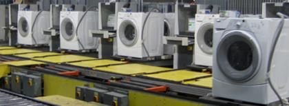 Whirlpool washers on the assembly line.