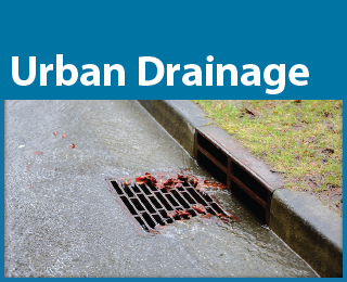 Photo: Water running into a storm drain