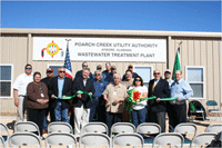 Ribbon cutting ceremony for an ARRA funded wastewater treatment plant expansion project for the Poarch Band of Creek Indians , December 2009.