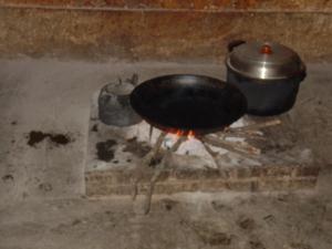 A pan on an open fire