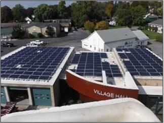 Aerial view of solar panels on a municipal building