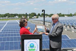 EPA Region 2 Deputy Administrator Catherine McCabe presents Brick, New Jersey, Mayor John G. Ducey with the Excellence in Site Reuse Award.