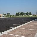 A parking lot made from permeable pavement, a type of green infrastructure