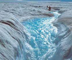 Photograph of river running through glacier.