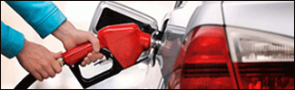 fill gasoline at a gas station with a border