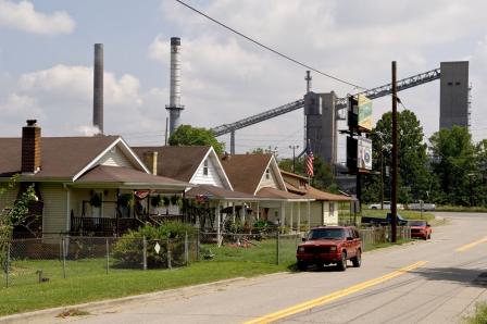 Image showing a residential area with an industrial facility nearby