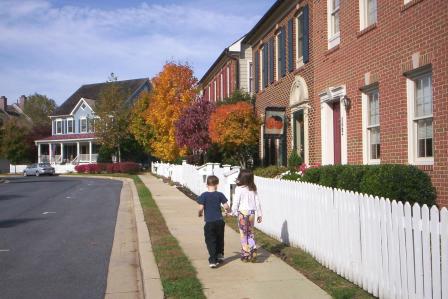 Children walking down a street in Kentlands, Gaithersburg, MD