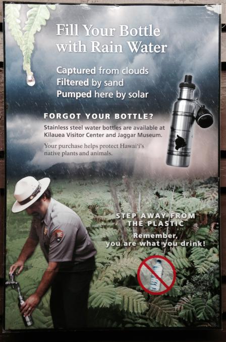 "Fill Your Bottle with Rain Water" poster showing ranger filling reusable stainless steel water bottle.
