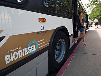 Passenger stepping off Biodiesel bus
