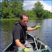Scientist collecting water samples.
