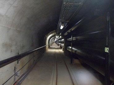 Red Hill Lower Access Tunnel with fuel pipelines runing along wall.