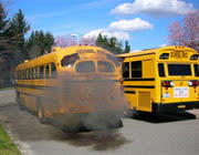 School bus with heavy black smoke from exhaust