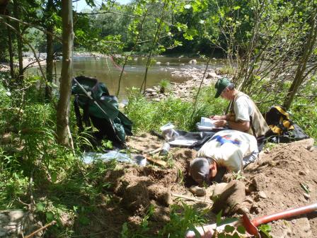 Crew members sampling soil at a site during NWCA 2011