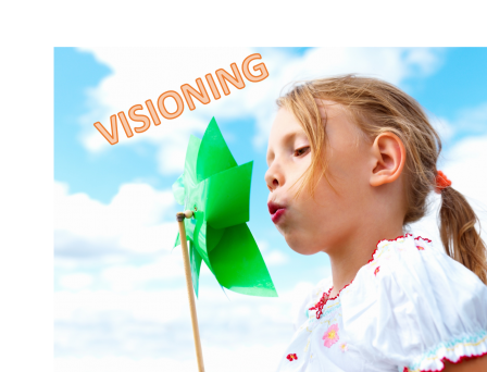 Visioning - A little girl blowing a pinwheel