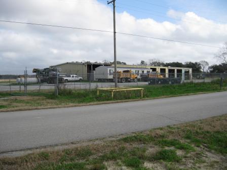 The fenced area north of the limestone road is being used by the Vermilion Parish Police Jury as a vehicle maintenance area
