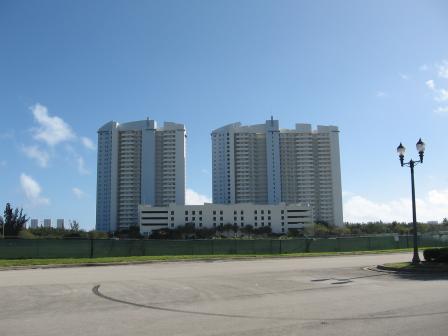 The two residential towers and parking at the site