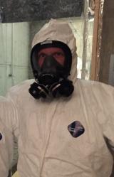 Lukas in his decontamination suit