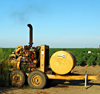 farm equipment with smoky stack