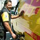Commercial fleet driver from DHL fills up with biodiesel