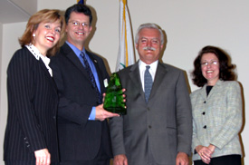 Jeff Scott presents award to representatives of the State of California