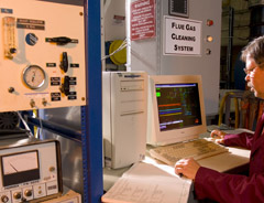 This Energy Specialist is performing an energy efficiency audit using a specially designed computer program