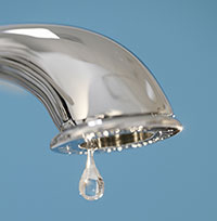 A leaking faucet illustrates the need for proper commercial water managmenet, which includes fixing leaks.