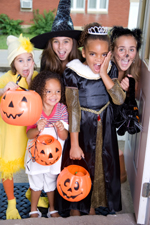 Photo of kids dressed up in costume for Halloween