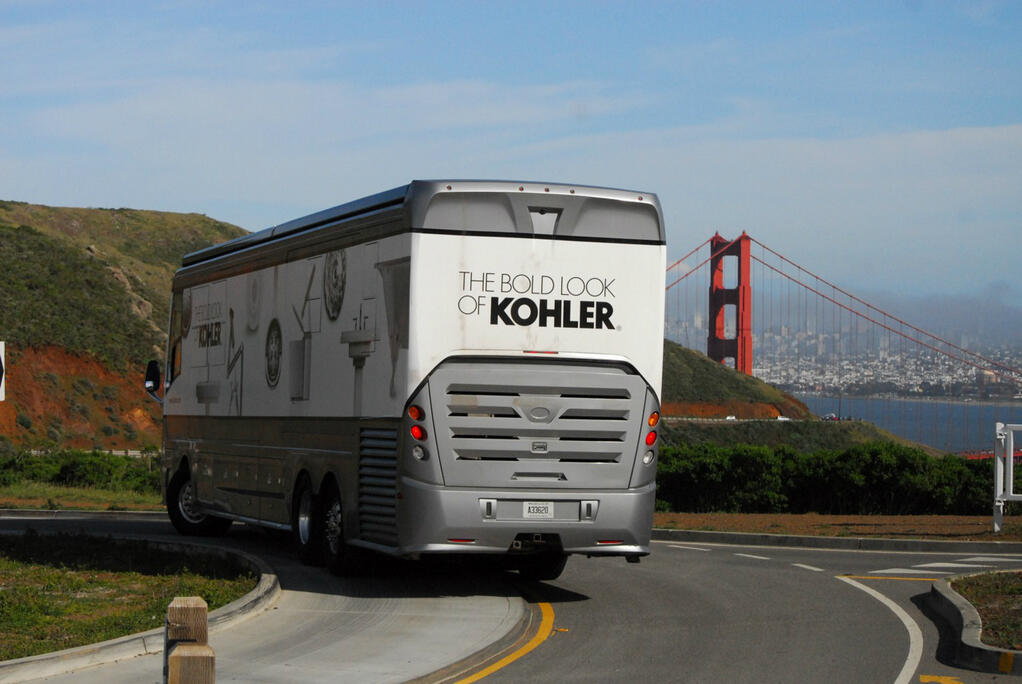 Kohler bus, with the Golden Gate bridge in the background